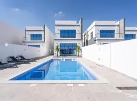Nasma Luxury Stays - Luxurious Villa with Private Pool & Close to Beach