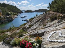 Sv&aelig;rt nydelig fritidshytte, hotel com estacionamento em Forland