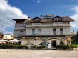 Albergo alla spiaggia, хотел в Фара д'Алпаго