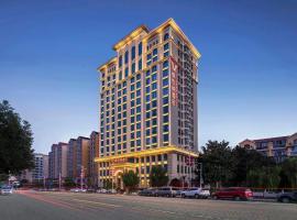 Vienna Hotel Henan Xinyang East Zone of Central Hospital, hotel con parcheggio a Pingqiao