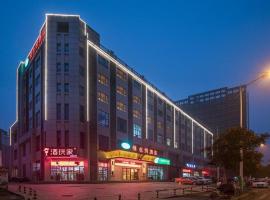 Vienna Hotel Xuzhou Junsheng Plaza Benteng Avenue Metro Station, отель в городе Сюйчжоу, в районе Gu Lou