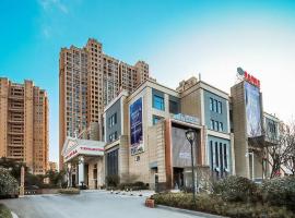 Vienna Hotel Jiangsu Suzhou Wujiang Bus Passenger Station, 3-stjernershotell i Hubin