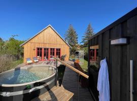 traumHaff Lotsen Romantik-Ostsee mit Kamin, privates NORDICSPA und Boot, pet-friendly hotel in Rieth