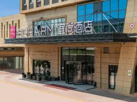 Echarm Hotel Yantai Wuzhou International, viešbutis mieste Fushan