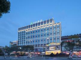 Nihao Hotel Wuxi Shuofang Airport, hótel með bílastæði í Daqiangmen