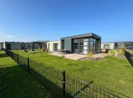 Enkhuizer Strand Chalet Hafenplätzchen mit Zaun Haus Nr 244