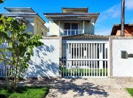 Casa Piscina em Condomínio 5min Praia ITACOATIARA.