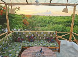 Cozy Bungalow - Garden, Terrace, Rooftop, Beach, hotel v destinaci Bwejuu