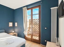 Accogliente camera singola con balcone a 500 mt dal mare, pension in Marina di Carrara