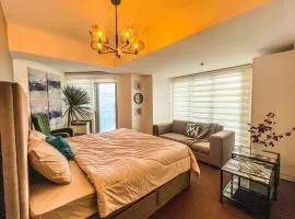 1BR Condo in Azure North - Oasis in the Sky