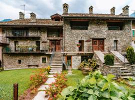 Maison Rosset agriturismo, camere, APPARTAMENTI e spa in Valle d'Aosta, מלון בנוס