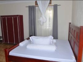 Migingo Suites, hotell i Entebbe