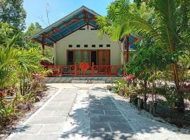 Delima Cottage New Room, hotel con estacionamiento en Langgur
