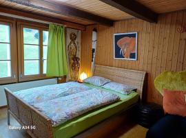 Afrika Zimmer mit Bergblick, habitación en casa particular en Emmetten