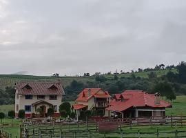Refugio de Montaña Huerta Sacha, hotel v mestu Chaupi