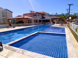 Apartamento sofisticado com piscina e vista privativa, khách sạn có hồ bơi ở Ilhéus