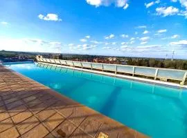 A beautiful one bedroom with a rooftop pool