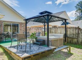 Home with Hot Tub and Yard, Less Than 2 Miles to The Wharf!, hotel in Orange Beach