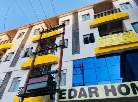 Abuzz Oxfordcaps Cedar Homes، فندق في Jhājra