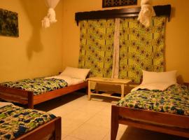 Room in BB - Amahoro Guest House - Triple Room with Shared Bathroom, homestay in Ruhengeri