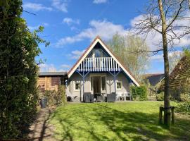 Grachthaus 6pers House with a private terrace and garden by the Lauwersmeer