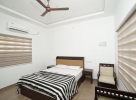 The Compact Comfort: Garggi's 1 BHK Villa, hytte i Kottayam