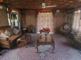 Queens Lakehouse, cabaña o casa de campo en Srinagar