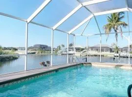 Relax with nature in our Waterfront 4 bedroom -HEATED POOL HOME-KING BED