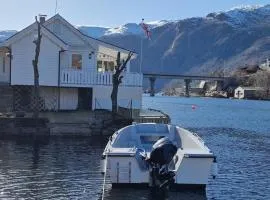 Sjötun Fjord Cabin, with boat