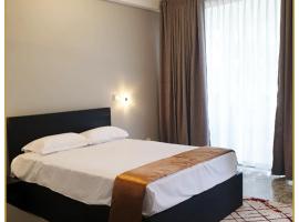 Orange Guest Homes & Banquet Hall, hotel em Serukele