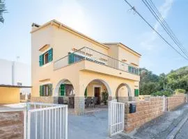 Amplia villa en Mallorca con jardín, 4 dormitorios y zona BBQ Cerca del mar en Portocolom
