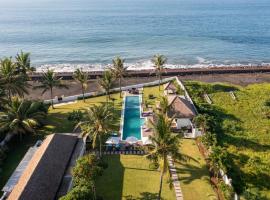 BougainVilla - Oceanfront villa with Cook, ideal for Weddings and Events，克拉瑪斯的飯店