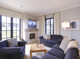 Reetland am Meer - Luxus Reetdachvilla mit 3 Schlafzimmern, Sauna und Kamin G05, hotell i Dranske