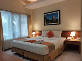 ๋ง๊ฒ๋์ ์์นํ ํธํ
Hotel Catur Putra