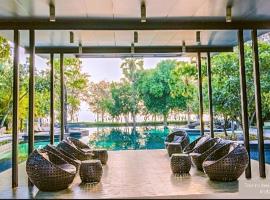 Rooms beachfront 50 meters, alojamento com cozinha em Cha Am