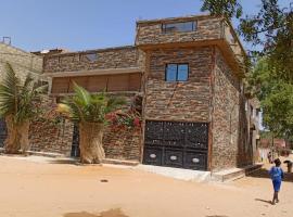 Maison Manour, chambre 'Tribal', B&B in Mbour