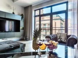 Lumina Loft Tymienieckiego with a view of the lake