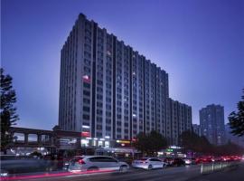 Vienna Hotel Shandong Jinan High-Tech Wanda Exhibition Center โรงแรมใกล้สนามบินนานาชาติจี่หนาน เหยาเฉียง - TNAในHongjialou