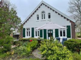 Landhaus up de Warft - Friesenrose, renta vacacional en Werdum