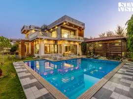 StayVista's Bella Dream - Mountain-View with Outdoor Pool, Lawn featuring a Gazebo & Indoor Games
