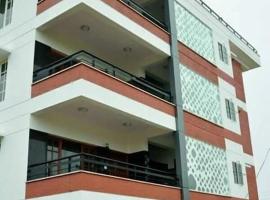 ZIONS APERTMENT, apartamento em Yelahanka