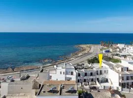 Camere arcobaleno fronte mare a Torre san Giovanni