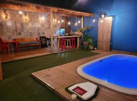 Casa com piscina aconchegante, отель в городе Рибейран-Прету