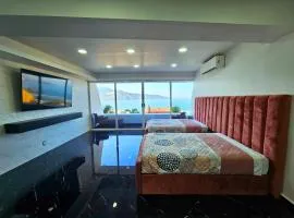 Suite PINK Hermosa habitación con vista al mar