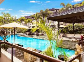 119 Santai Resort - Poolside Apartment by uHoliday, hotel familiar en Casuarina