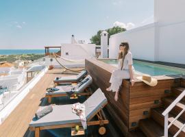 Kalathos Square luxury suites, בית נופש בקלטוס