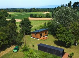 Wooden house and modern container in Lekneno, near Zagreb, tradicionalna kućica u gradu 'Lekneno'