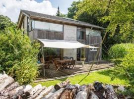 Gemütliches Ferienhaus in Siedlung Neu Borstel mit Großem Garten, hotel in Bispingen