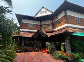 Jaladhija - Lakeview Homestay, habitación en casa particular en Kozhikode