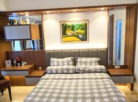 The cozy & luxury room in Podomoro City Deli Medan, hotel in Medan